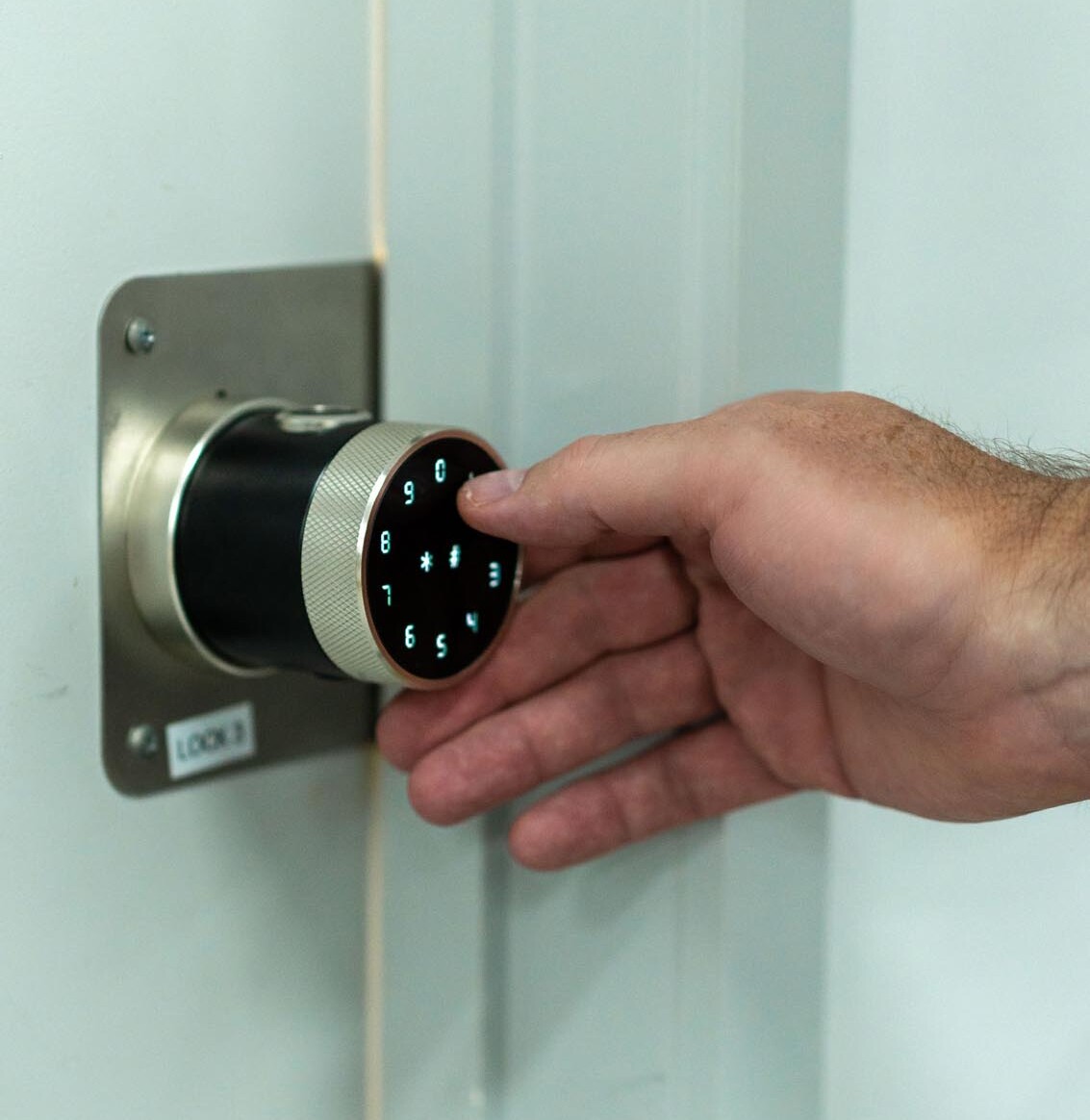Secure, biometric door handle